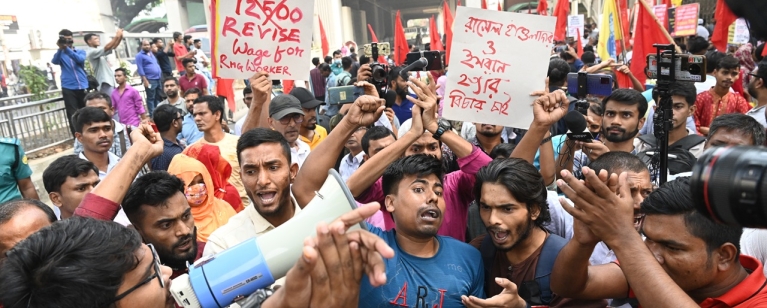 Garment workers' union members take part in a protest to demand an increase in the minimum wage in front of the Press Club in Dhaka, Bangladesh, on November 10, 2023. Photo credit: Shutterstock.