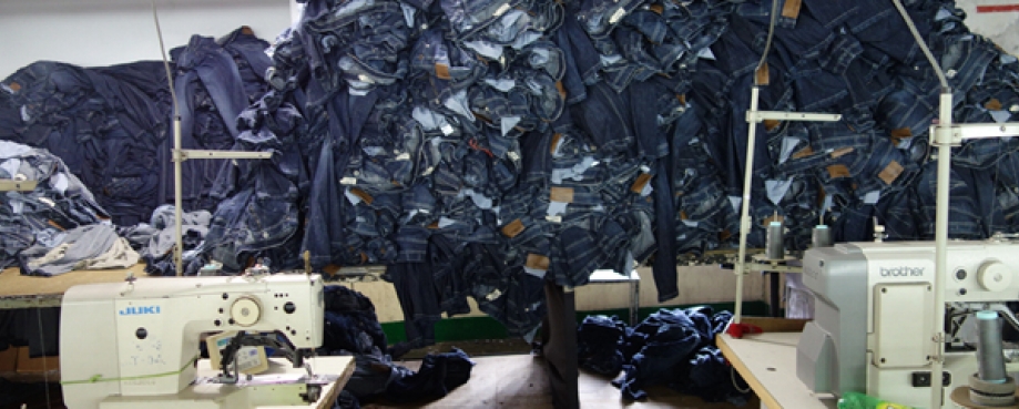Jeans piled high in a Bangladesh factory
