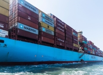 Side view on the fully loaded cargo container ship in the Red Sea, owned by the Maersk Line. Photo credit: Shutterstock.