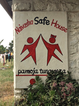 A sign for Naivasha Safe House