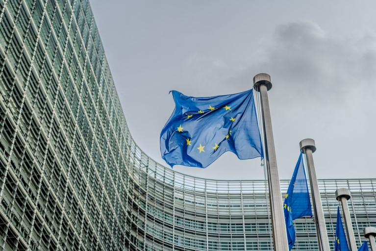 European EU flags in front of the Berlaymont building, headquarters of the European commission in Brussels. Photo credit: Shutterstock.