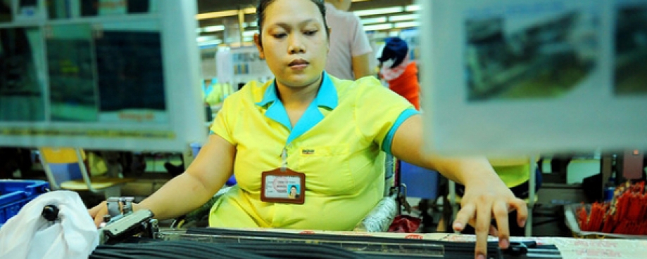 Disabled factory worker. Photo, ILO