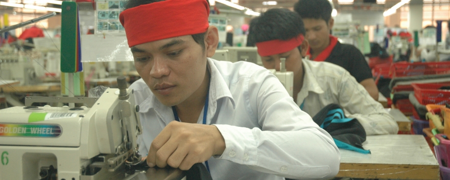 Cambodian male garment workers © ILO