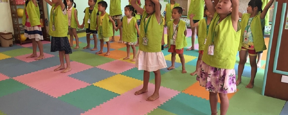 Children in factory child friendly space