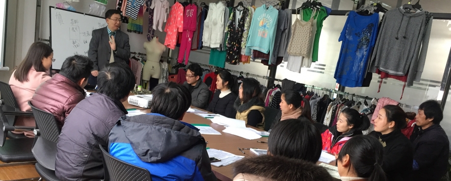 Jia Hongwei runs an ETI/ILO Score Training session at Xiangshan Dasheng Knitting Factory