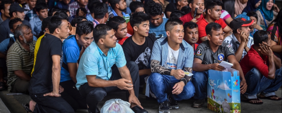 Migrant workers in Malaysia courtesy of Shutterstock