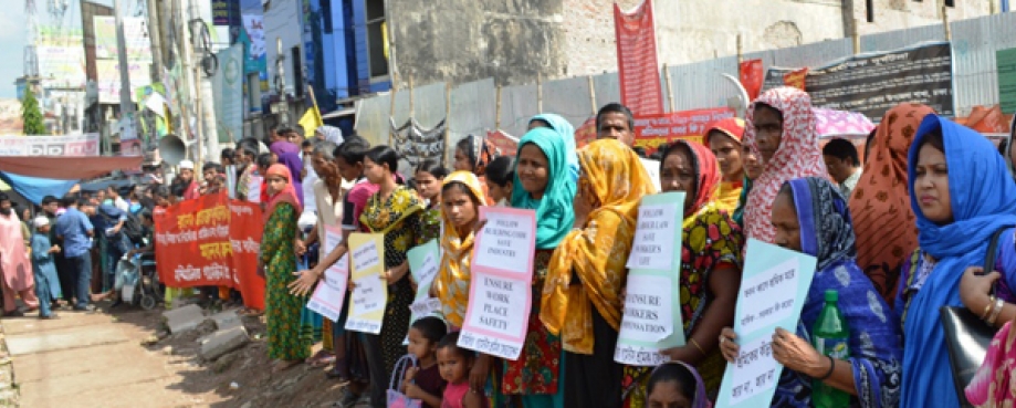 Women demonstrate at the collapsed Rana Plaza site, Bangladesh