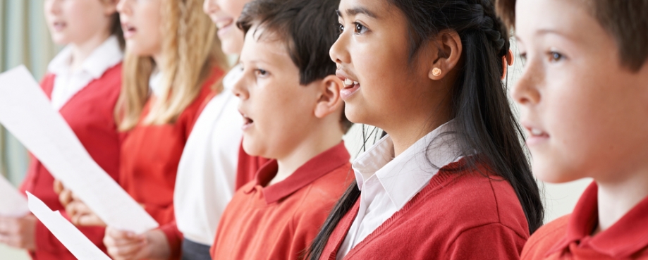 Children singing in a school choir courtesy of shutterstock.com