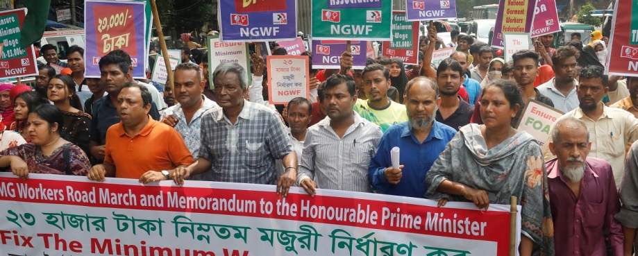 The National Garment Workers Federation marched and held a rally in Dhaka's Shahbag demanding a minimum wage of monthly BDT 23,000 for garment workers. Photo credit: Shutterstock.