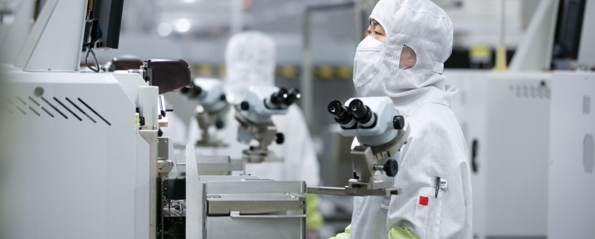 Workers assemble cameras, China
