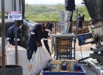 Workers collecting fibres at the Sanergy biochar facility in Kenya. Photo credit: Henrique Pacini, UN Trade and Development.
