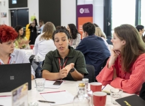 ETI members engaging in discussions at ETI Member Day 2024. 