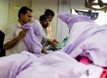 Male garment factory workers, India