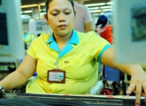 Disabled factory worker. Photo, ILO