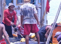 Migrant workers working on a Thai boat, Samut Sakhon, Thailand.