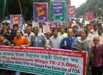 The National Garment Workers Federation marched and held a rally in Dhaka's Shahbag demanding a minimum wage of monthly BDT 23,000 for garment workers. Photo credit: Shutterstock.