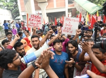 Garment workers' union members take part in a protest to demand an increase in the minimum wage in front of the Press Club in Dhaka, Bangladesh, on November 10, 2023. Photo credit: Shutterstock.