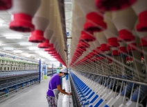 Female garment factory worker, China