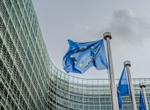 European EU flags in front of the Berlaymont building, headquarters of the European commission in Brussels. Photo credit: Shutterstock. 